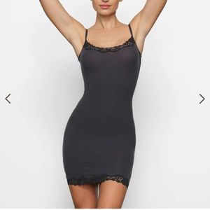 BRAND NEW SKIMS! Lace slip dress in black size M